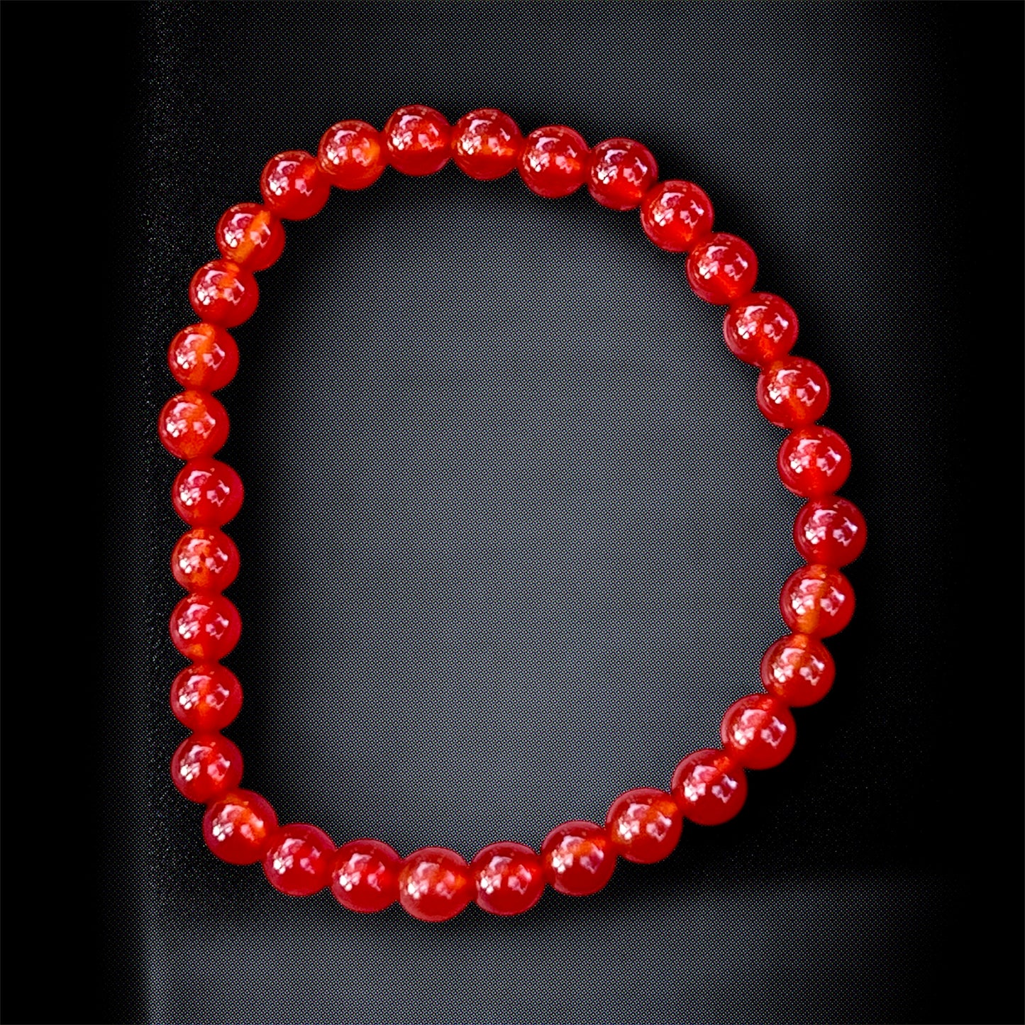 Natural red carnelian crystal bracelet for energizing, motivation & vitality.