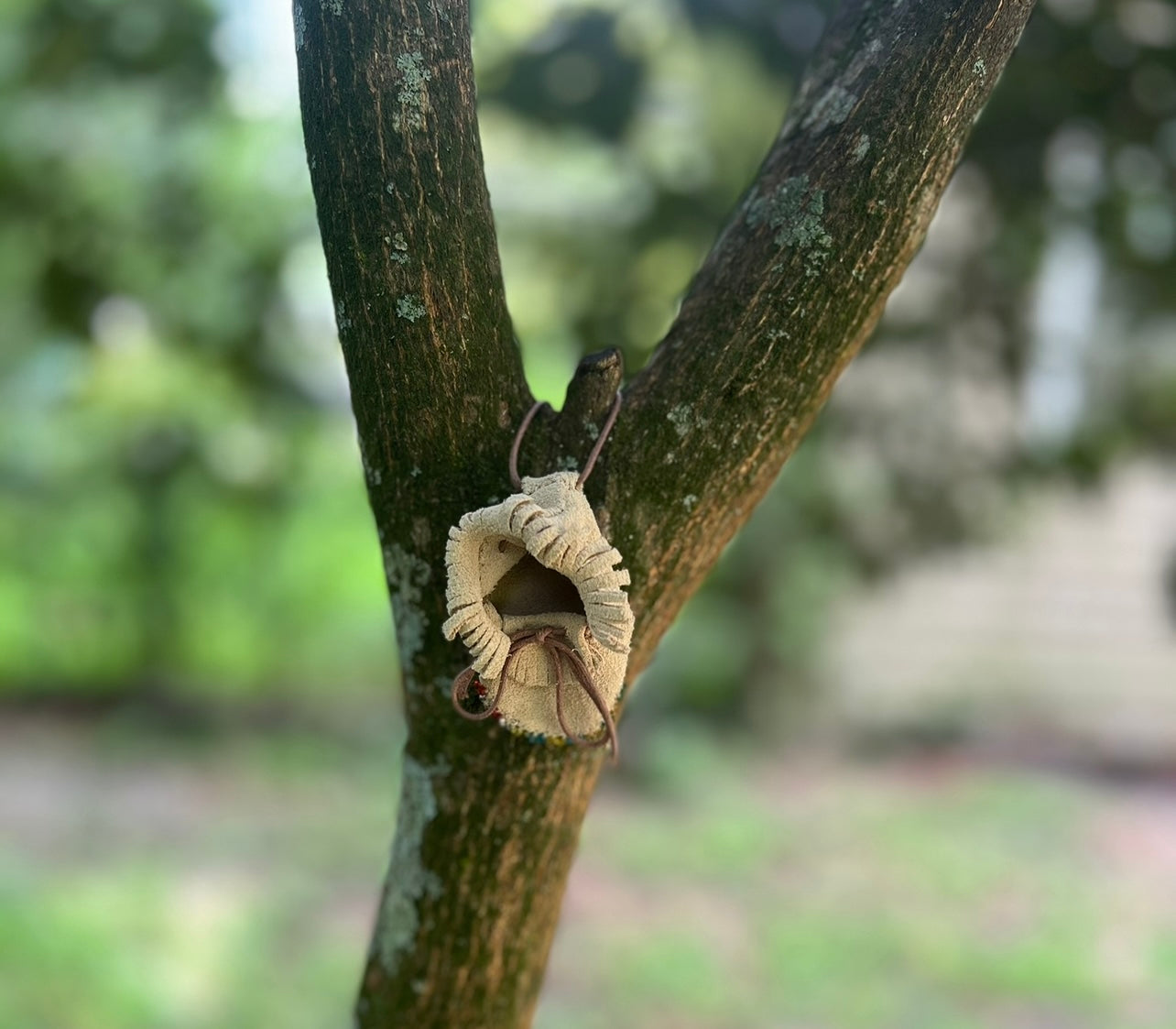 vintage medicine bag with protective spell work and adjustable neck cord. Leather amulet D