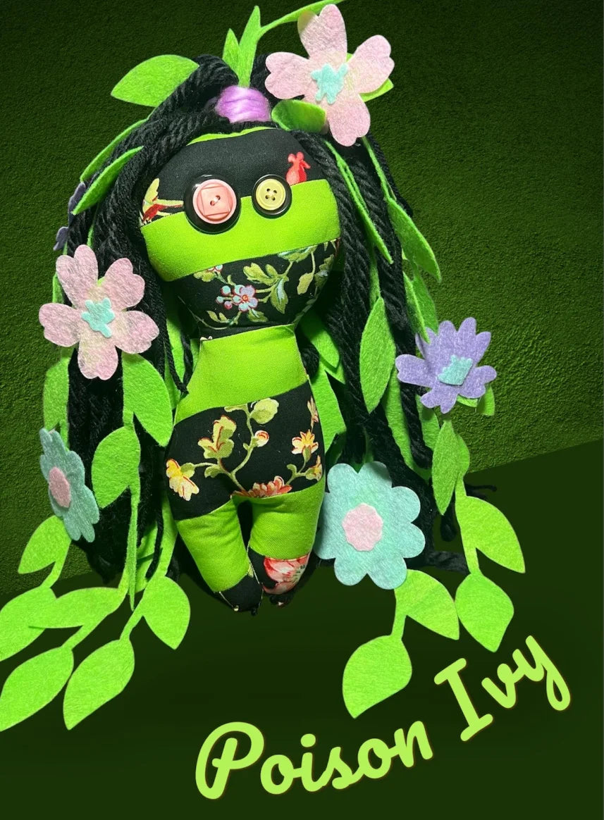 Handmade Poison Ivy poppet doll with green leaves and red accents, perfect for nature-inspired magic