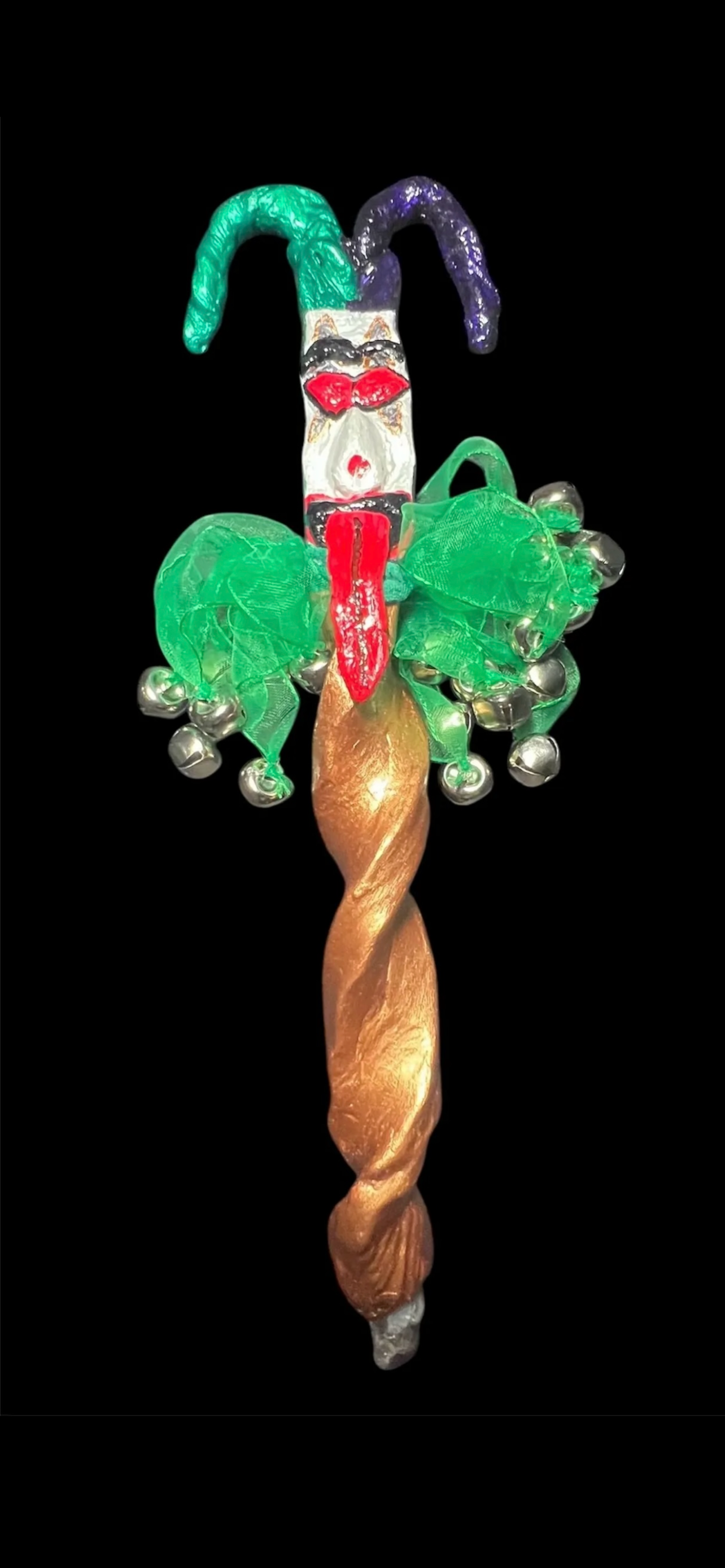 Whimsical jester wand adorned with jingling bells and multicolored streamers for festive occasions