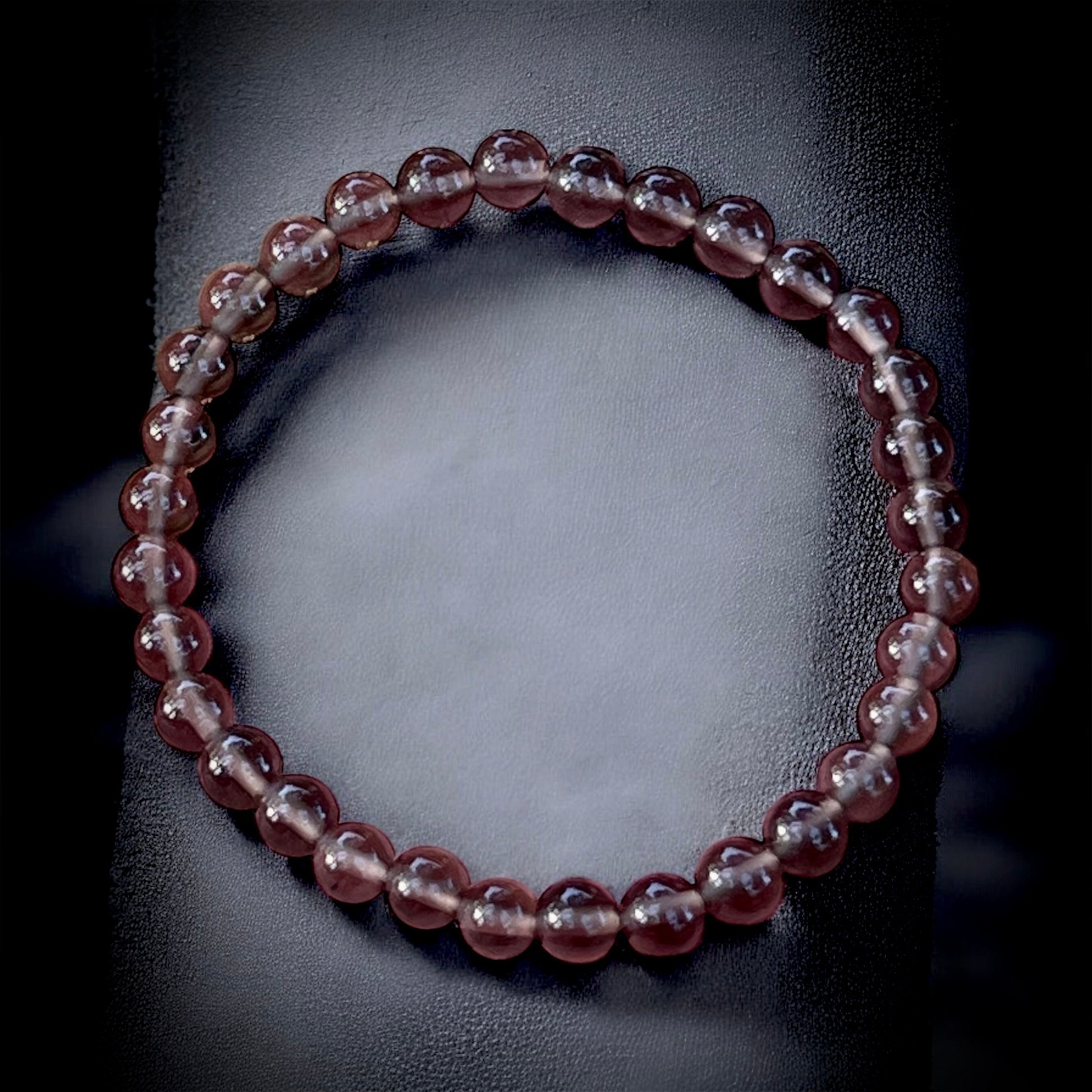 Natural smokey quartz crystal bracelet for grounding, protection, and emotional balance.