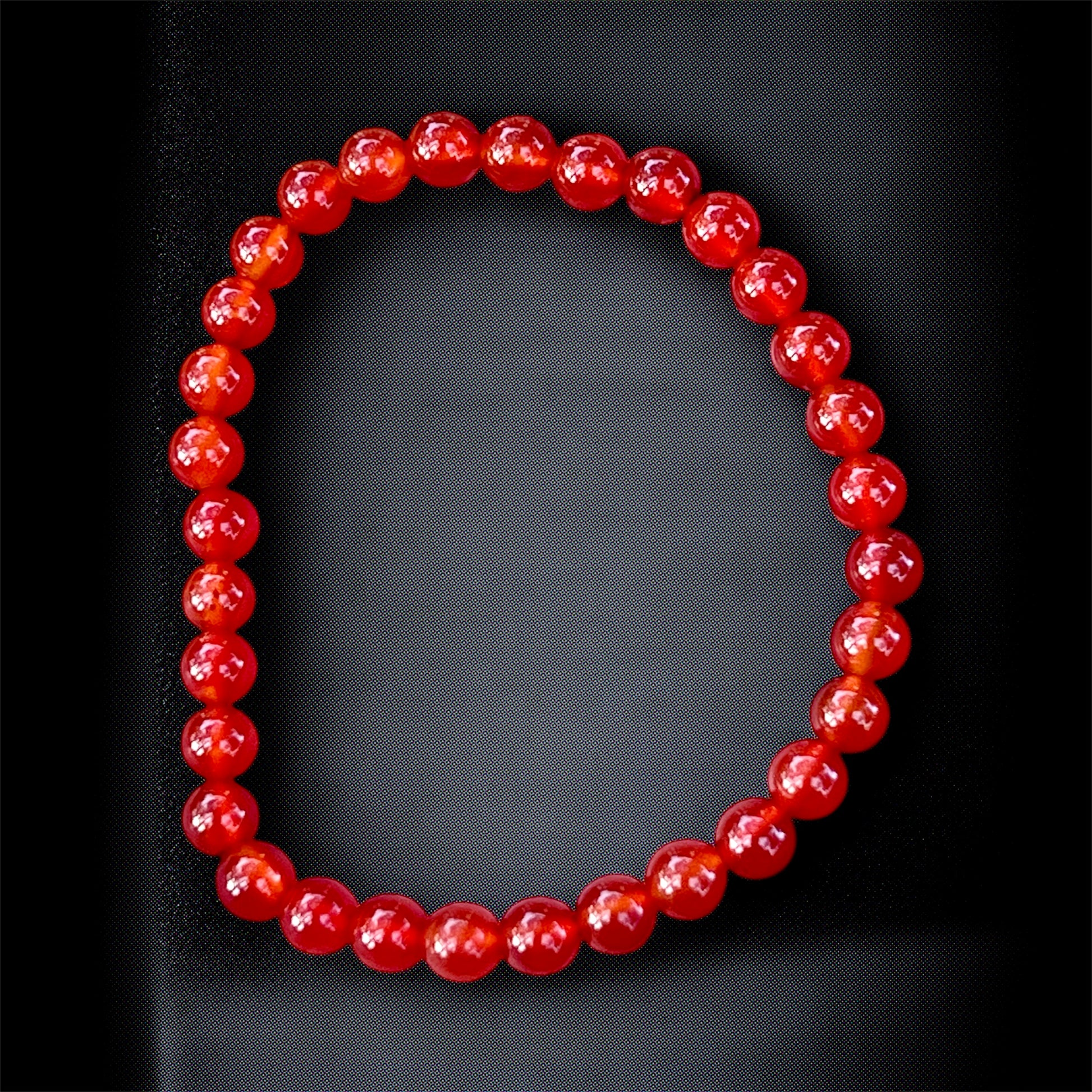 Natural red carnelian crystal bracelet for energizing, motivation & vitality.