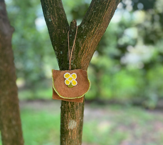 vintage medicine bag with protective spell work and adjustable neck cord.