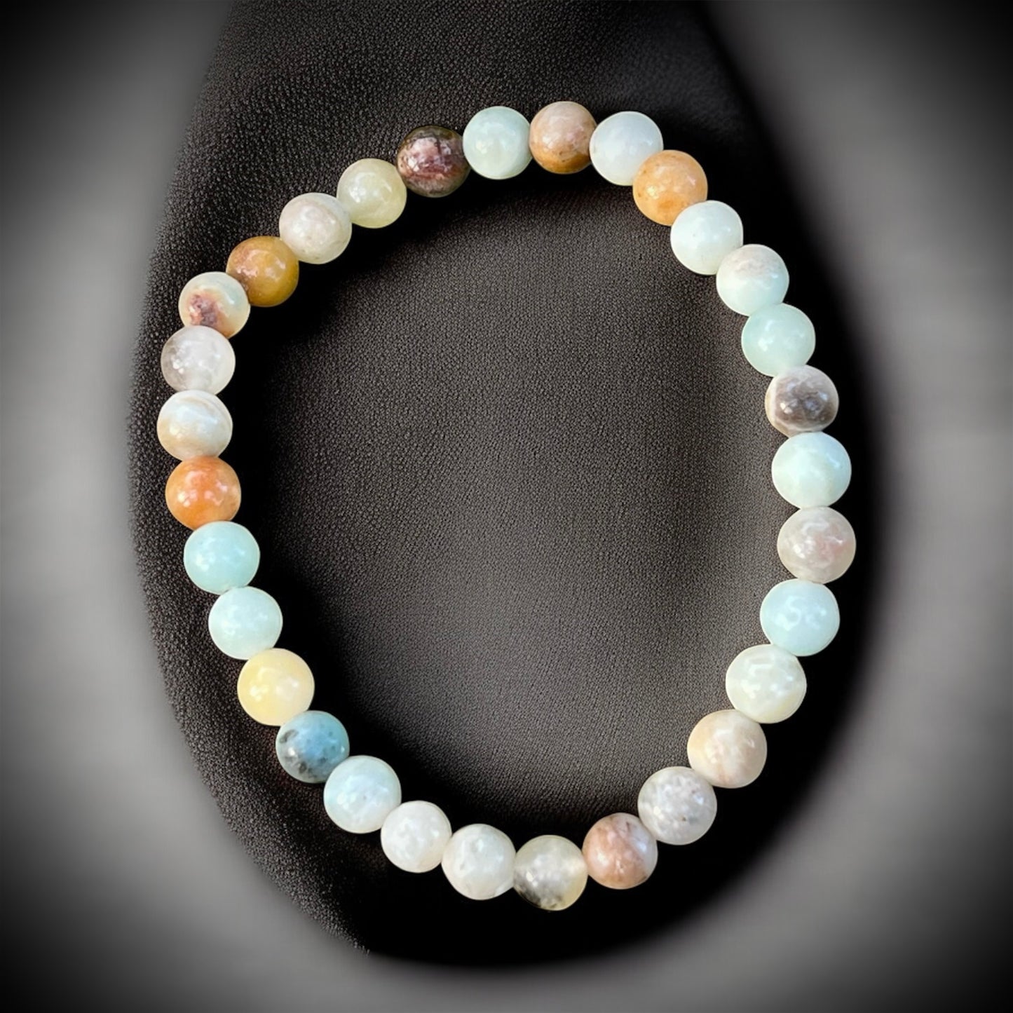 Multi-color amazonite crystal bracelet for calm, emotional balance & positive energy.
