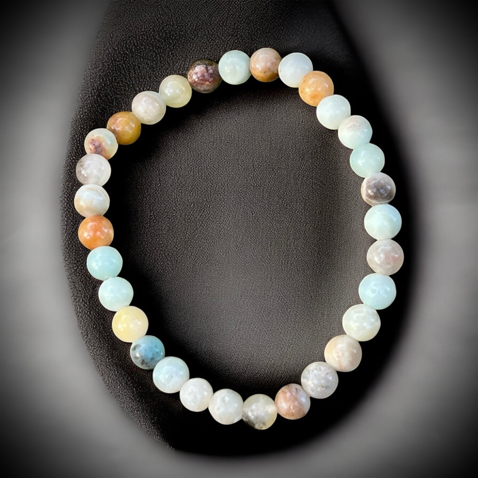 Multi-color amazonite crystal bracelet for calm, emotional balance & positive energy.