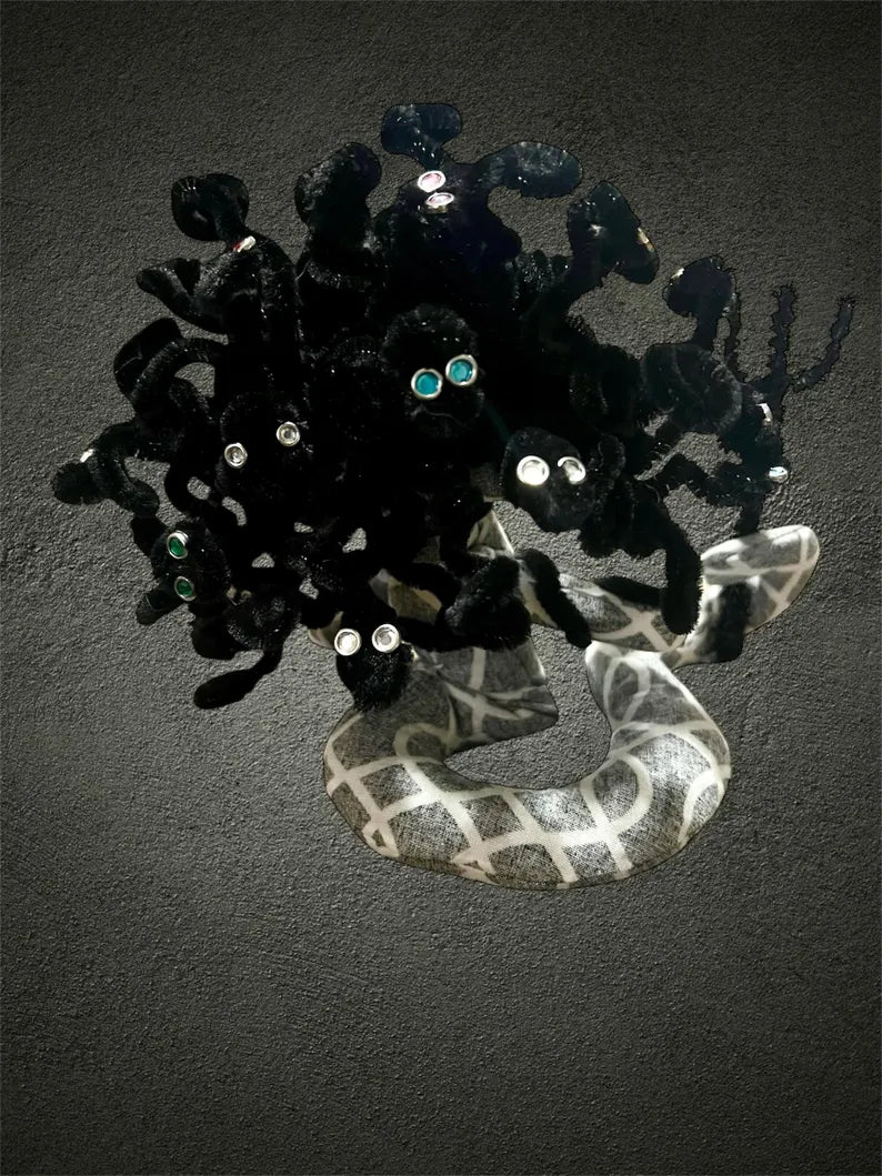 Medusa snake goddess with poseable serpent hair. Perfect for Greek mythology collectors, witchcraft altars, and gothic decor.