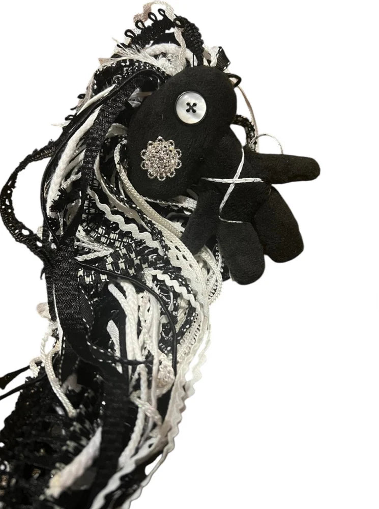 shadow and light spirit doll for healing and shadow work. Embodies emotional depth and transformation.