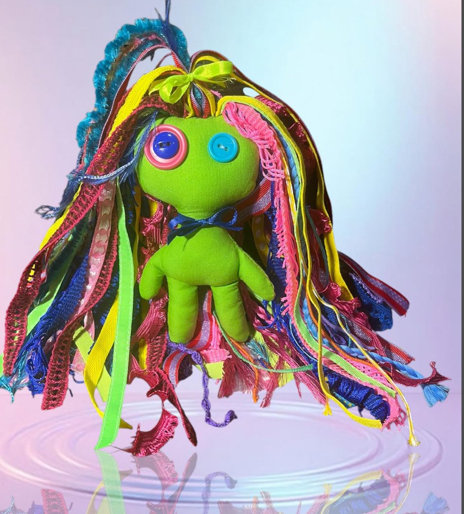 UV-reactive poppet that glows under blacklight. Colorful witchy companion perfect for altars and magical decor.