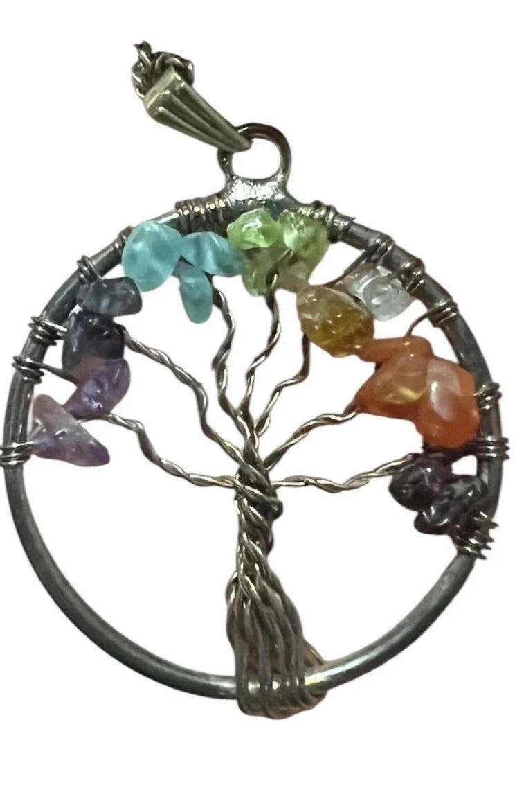 Magical Tree of Life pendant adorned with vibrant chakra stones, symbolizing grounding, spiritual harmony, and protection — a mystical talisman for balance and energy flow